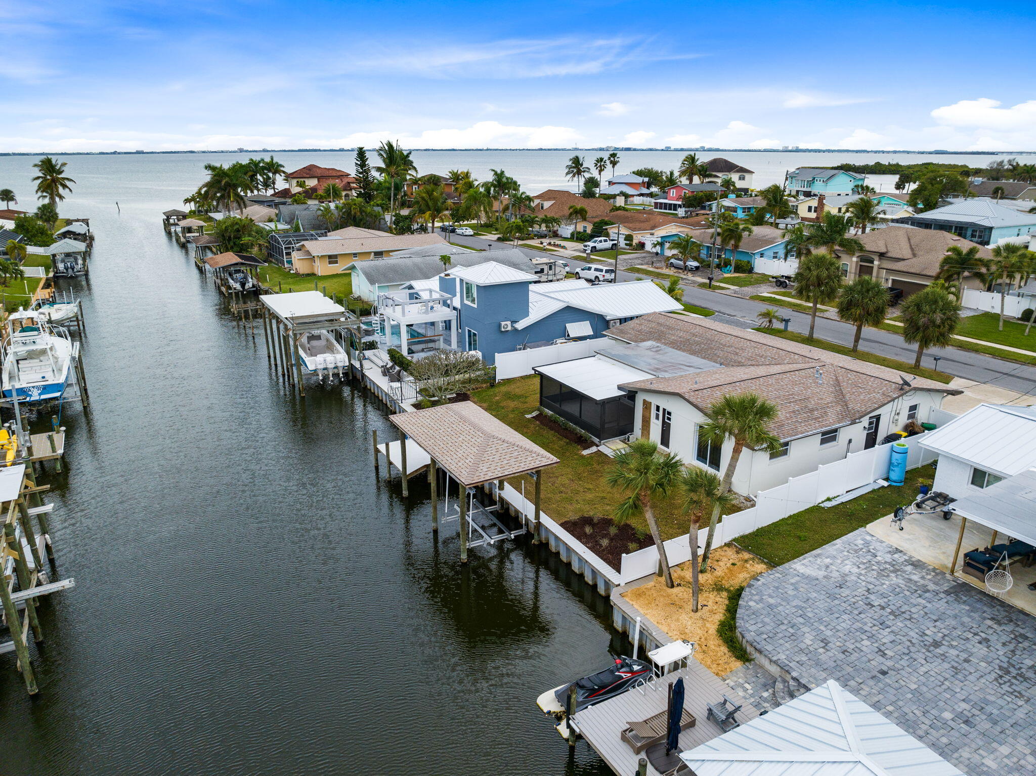 an aerial view of a dinning table and chairs