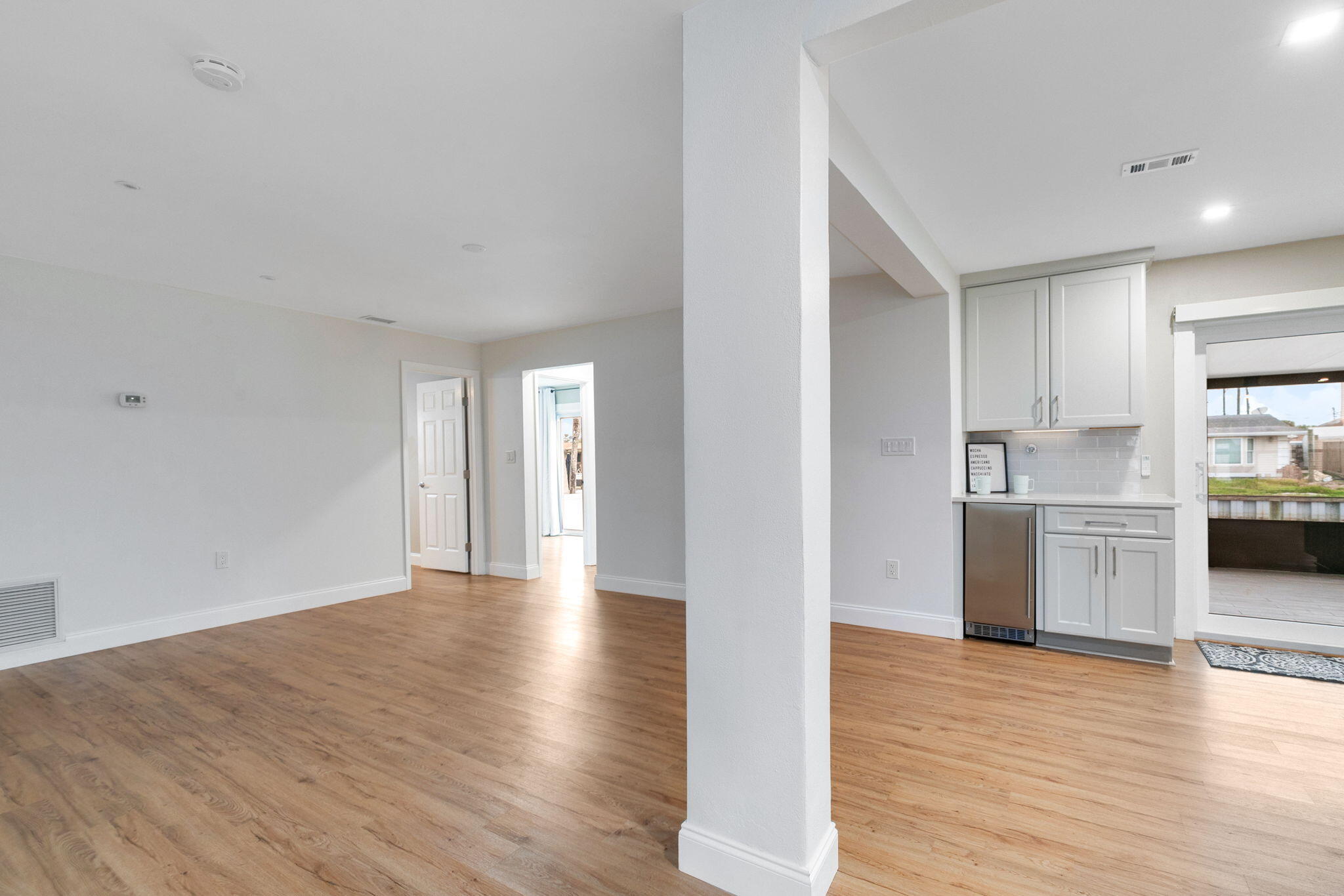 1700 Rochelle Parkway Merritt Island, FL 32952 - Photo 12 of 35 a view of a kitchen with a sink and a refrigerator