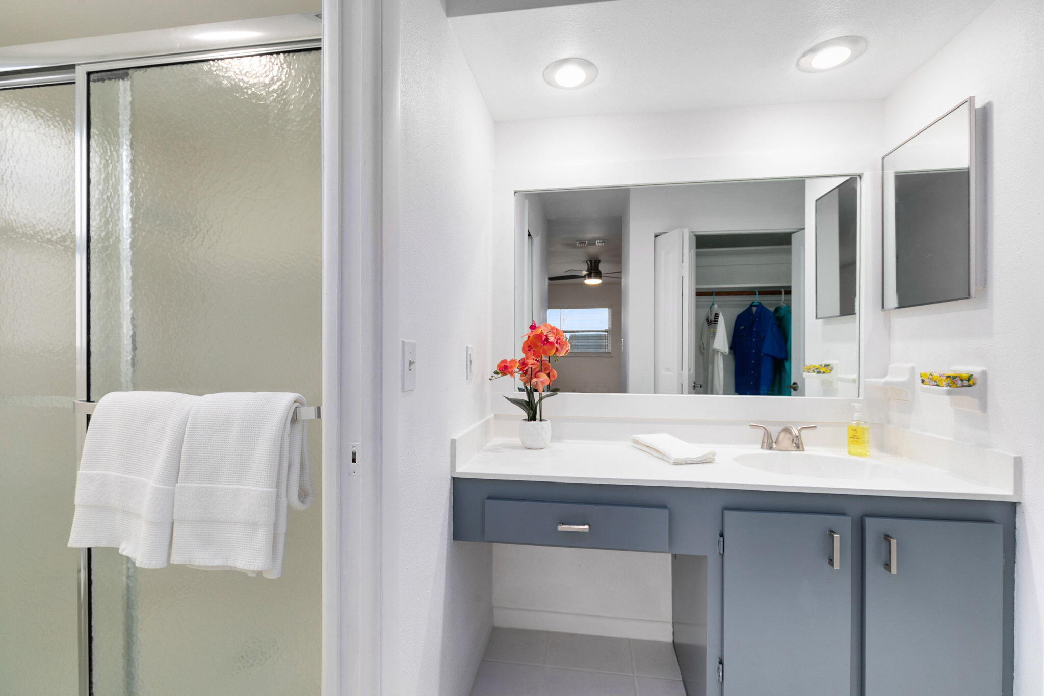 1700 Rochelle Parkway Merritt Island, FL 32952 - Photo 18 of 35 a en suite bathroom with a granite countertop sink and a mirror