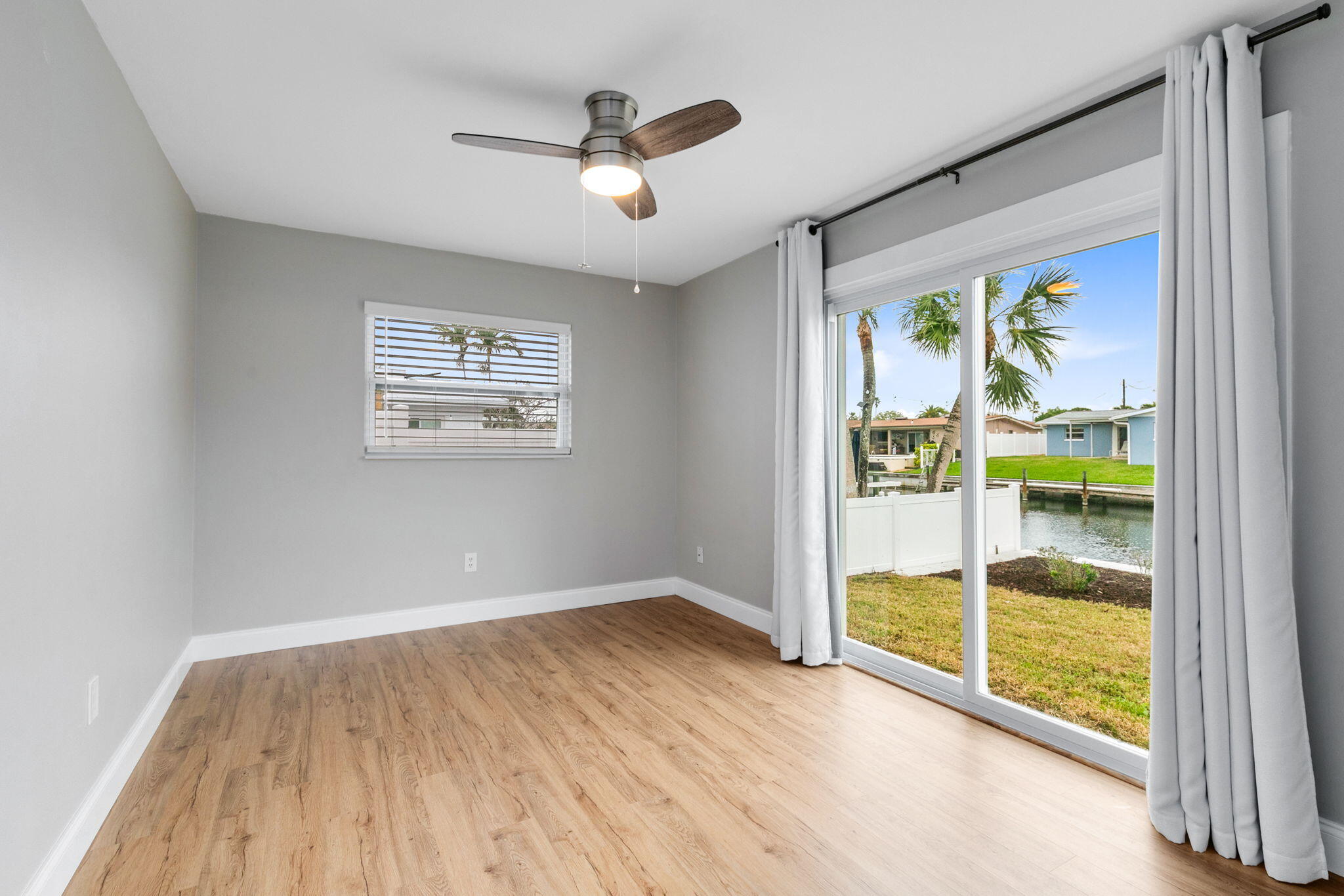 1700 Rochelle Parkway Merritt Island, FL 32952 - Photo 20 of 35 an empty room with windows