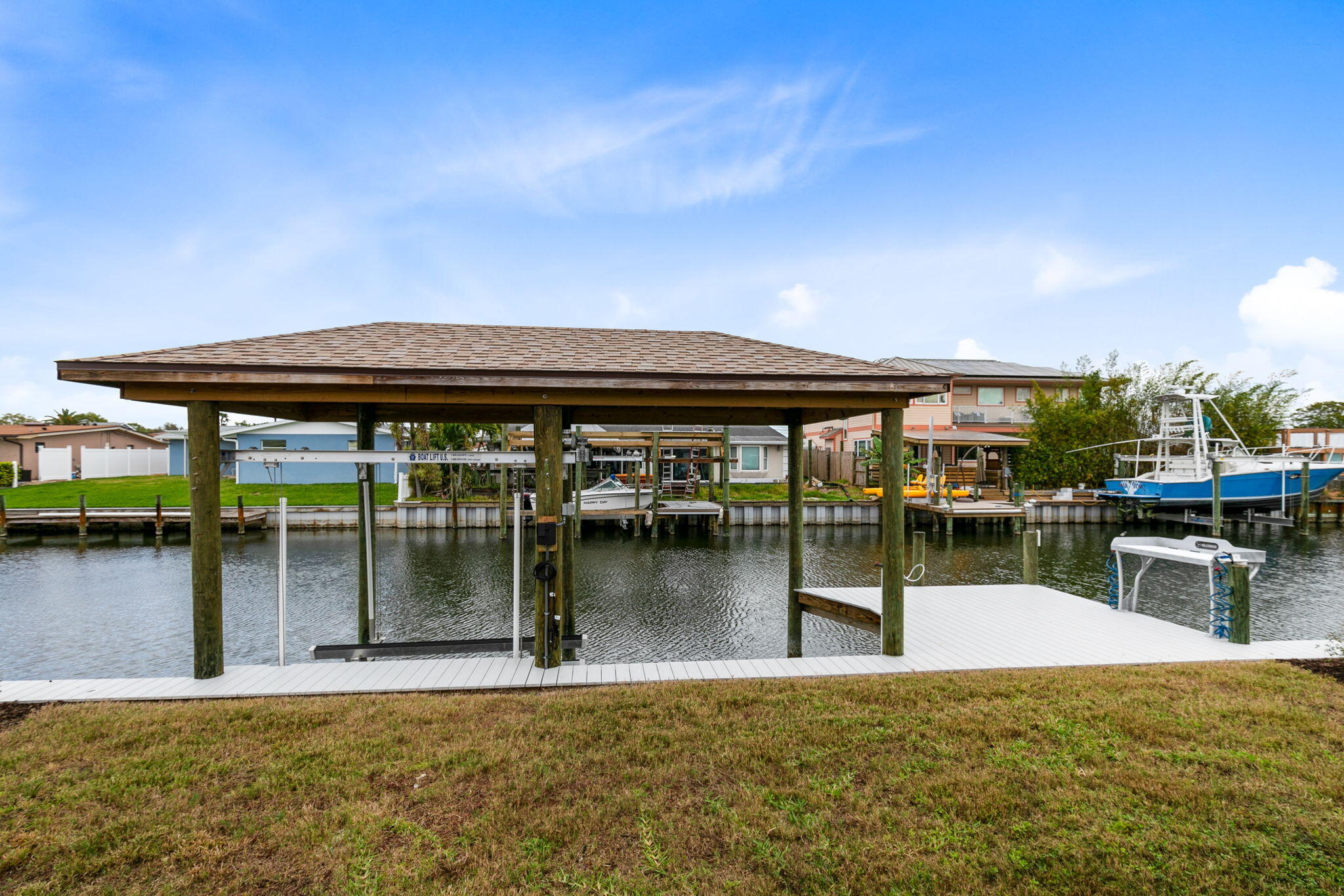 1700 Rochelle Parkway Merritt Island, FL 32952 - Photo 27 of 35 a view of a swimming pool with outdoor seating