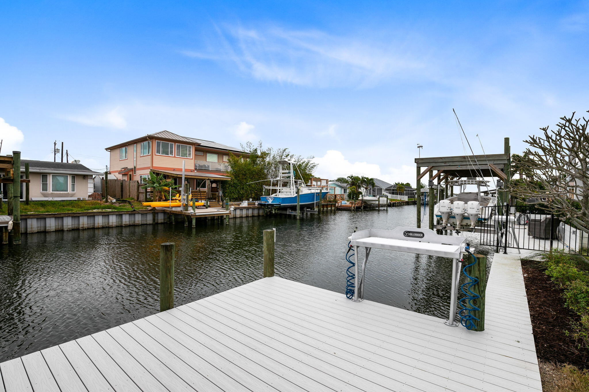 1700 Rochelle Parkway Merritt Island, FL 32952 - Photo 30 of 35 a view of a lake with a table and chairs