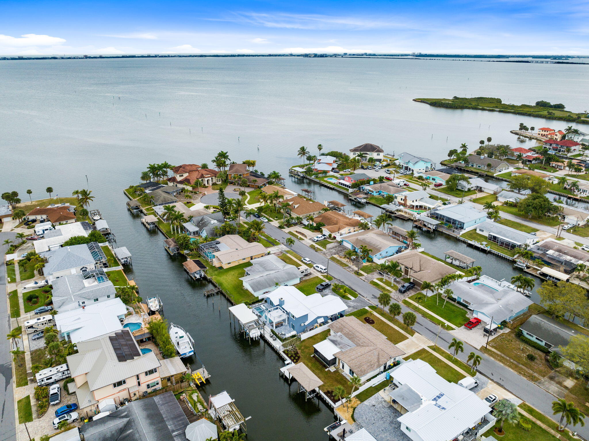 1700 Rochelle Parkway Merritt Island, FL 32952 - Photo 3 of 35 an aerial view of a house with a lake view