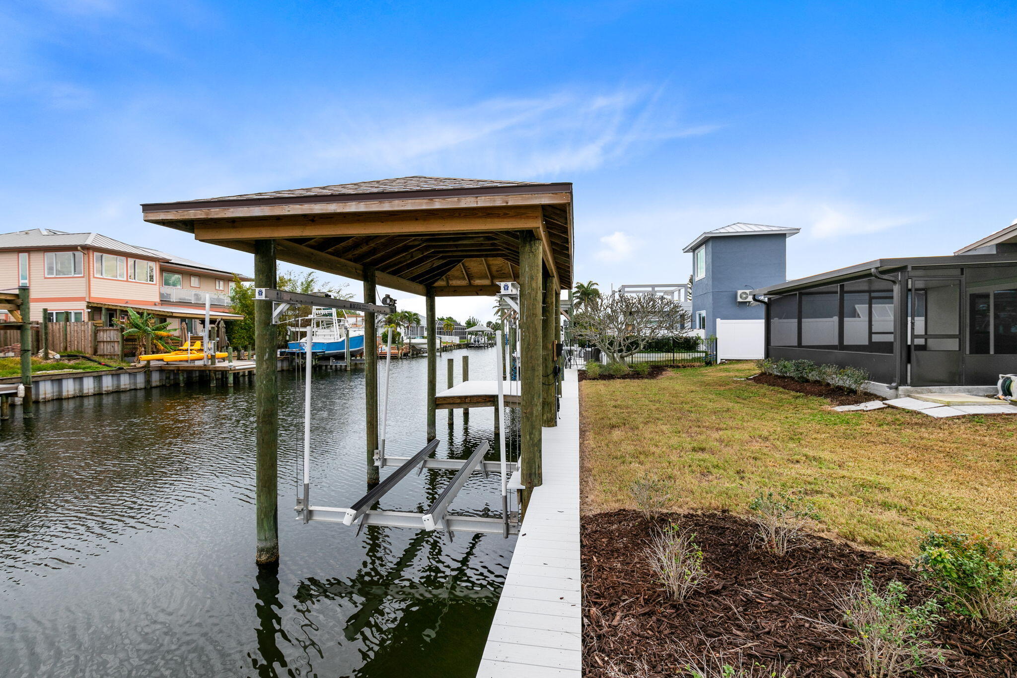 1700 Rochelle Parkway Merritt Island, FL 32952 - Photo 31 of 35 a view of a lake with a house