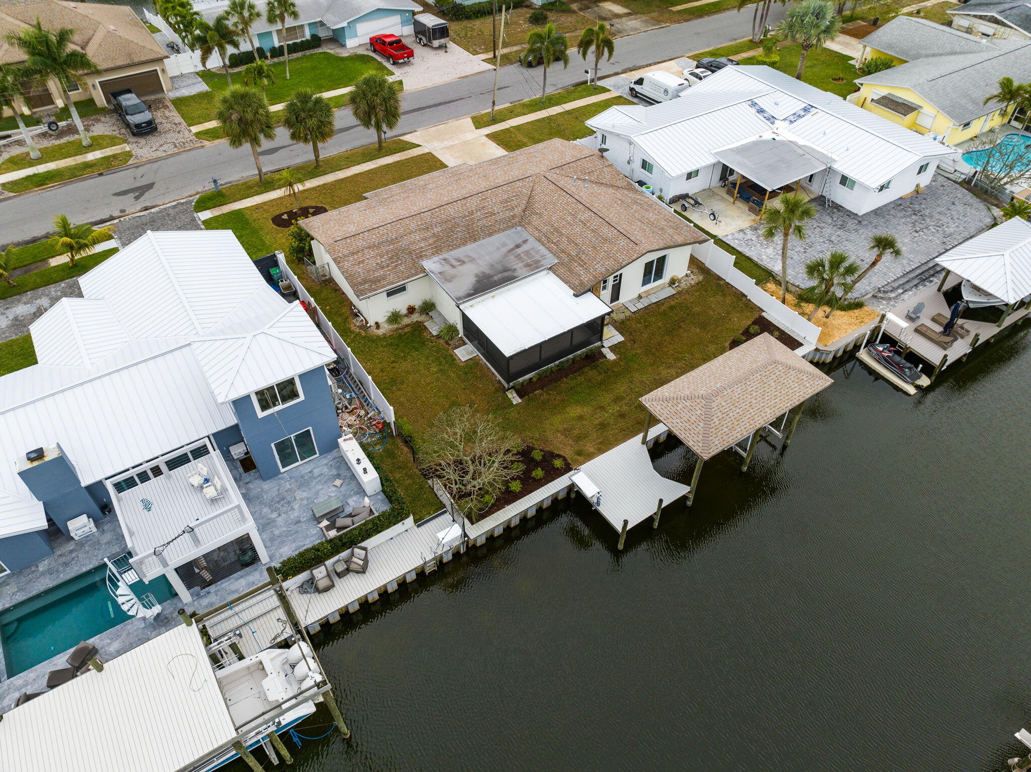 1700 Rochelle Parkway Merritt Island, FL 32952 - Photo 4 of 35 an aerial view of a house with a garden