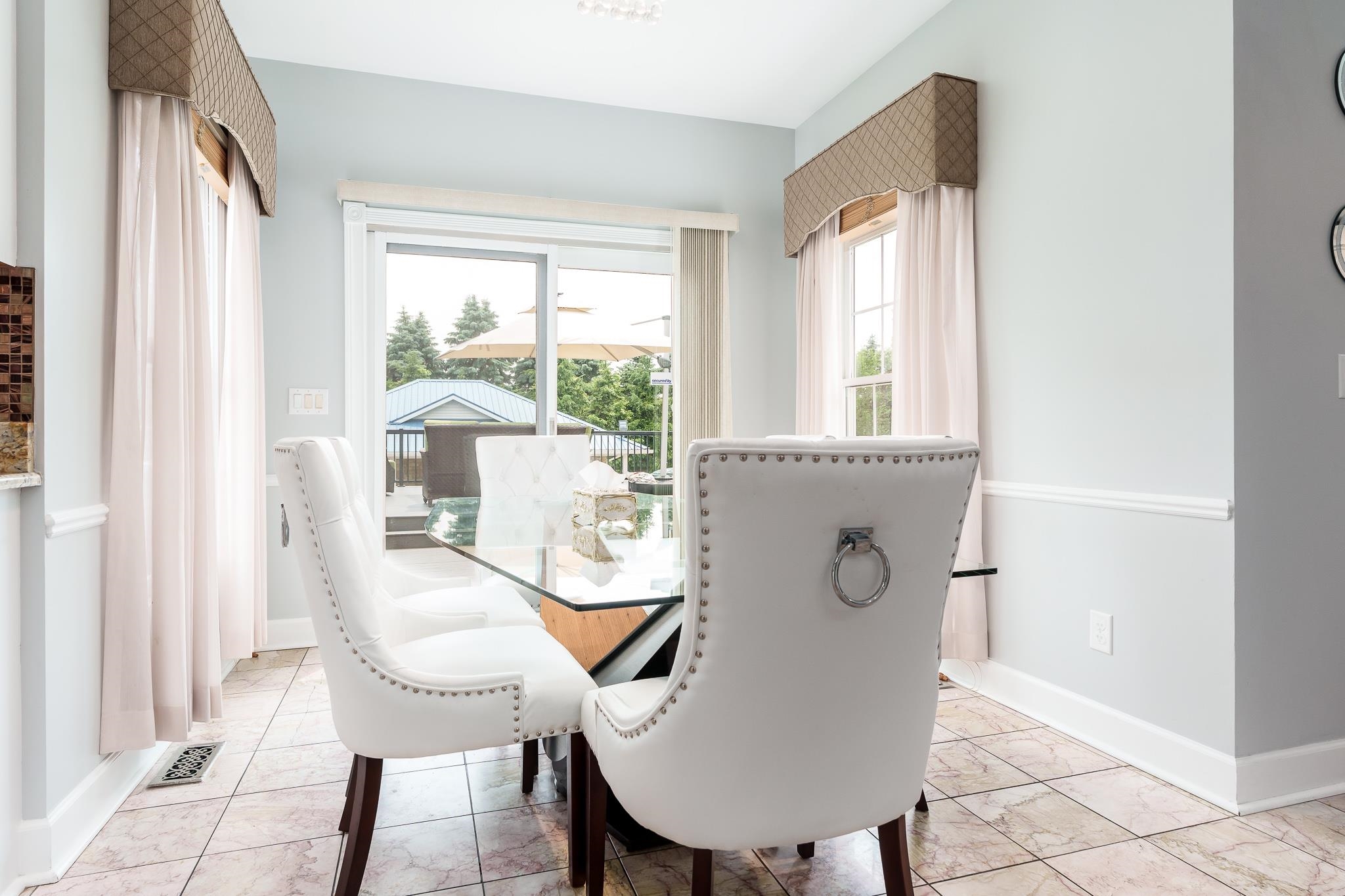 9311 Ridgeview Road Belvidere, IL 61008 - Photo 28 of 89 a view of a dining room with furniture and a window