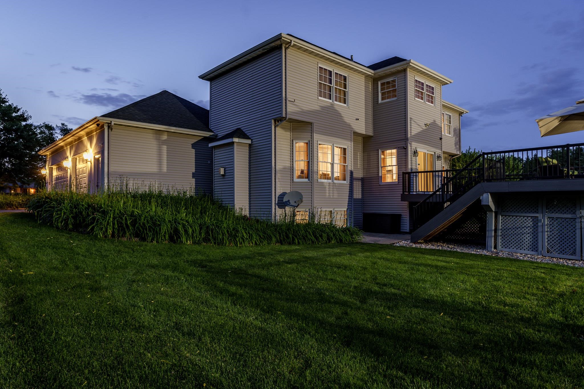 9311 Ridgeview Road Belvidere, IL 61008 - Photo 3 of 89 a front view of a house with a yard and garage