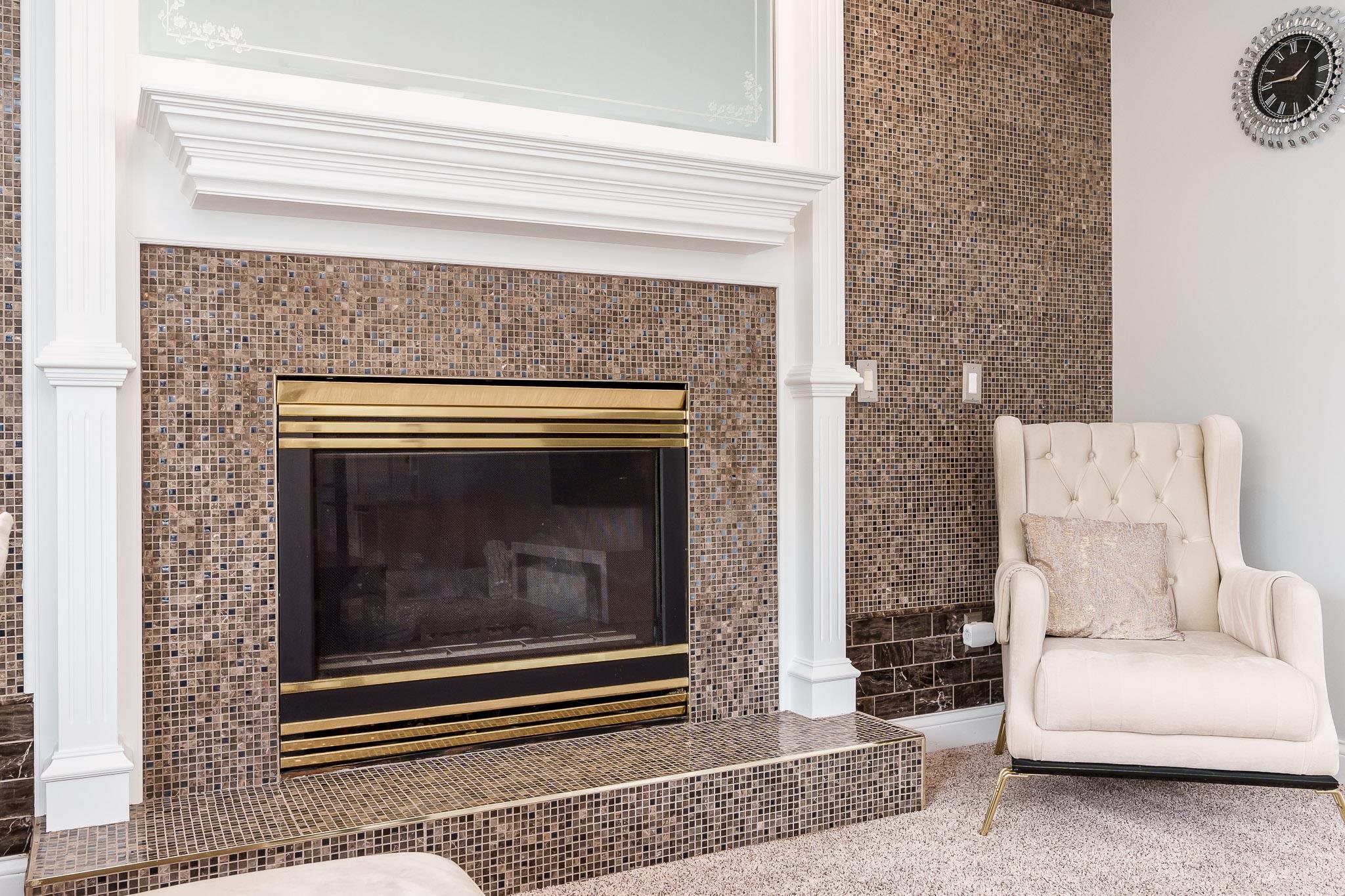 9311 Ridgeview Road Belvidere, IL 61008 - Photo 31 of 89 a living room with a fireplace and a rug