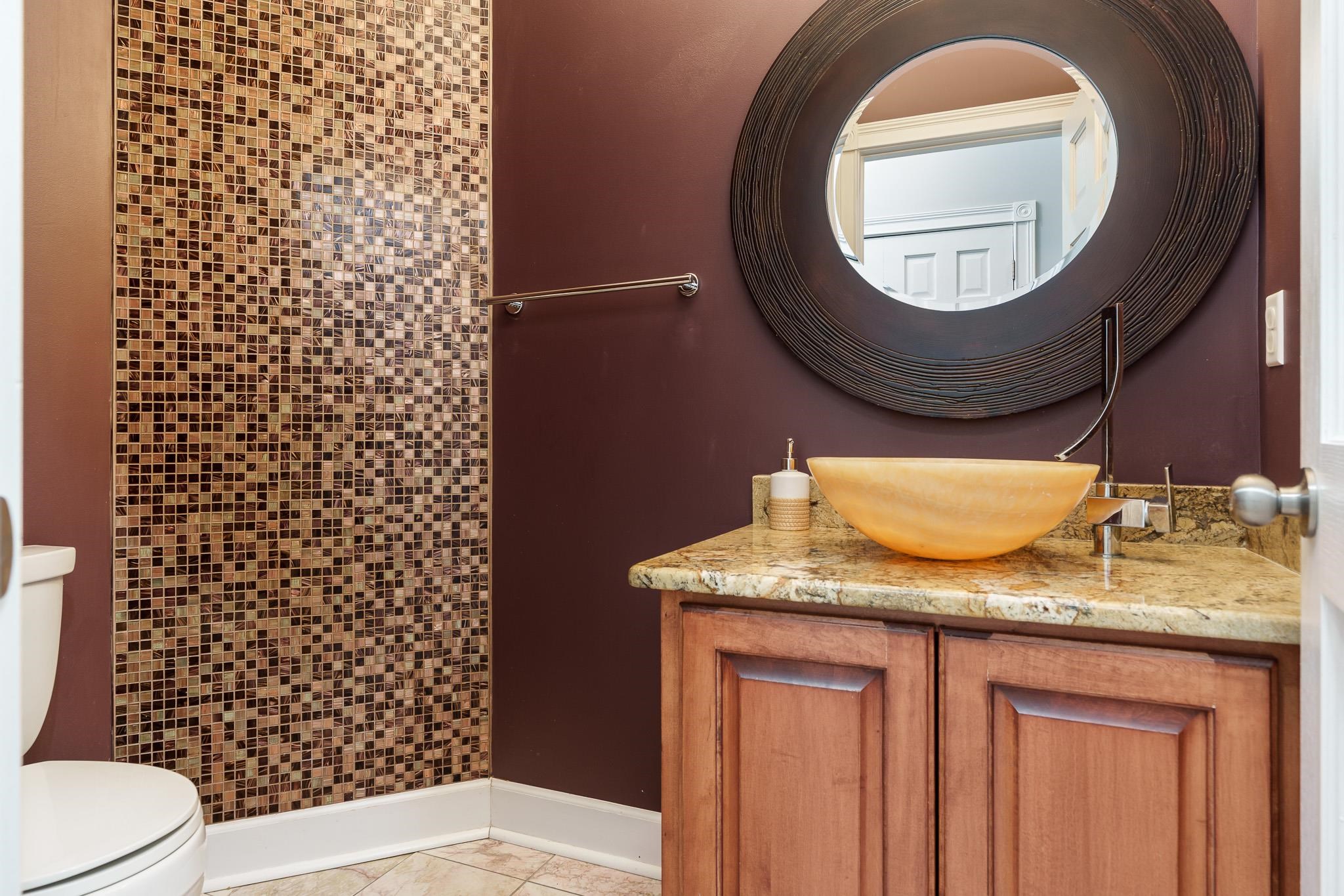 9311 Ridgeview Road Belvidere, IL 61008 - Photo 33 of 89 a bathroom with a granite countertop sink and a mirror