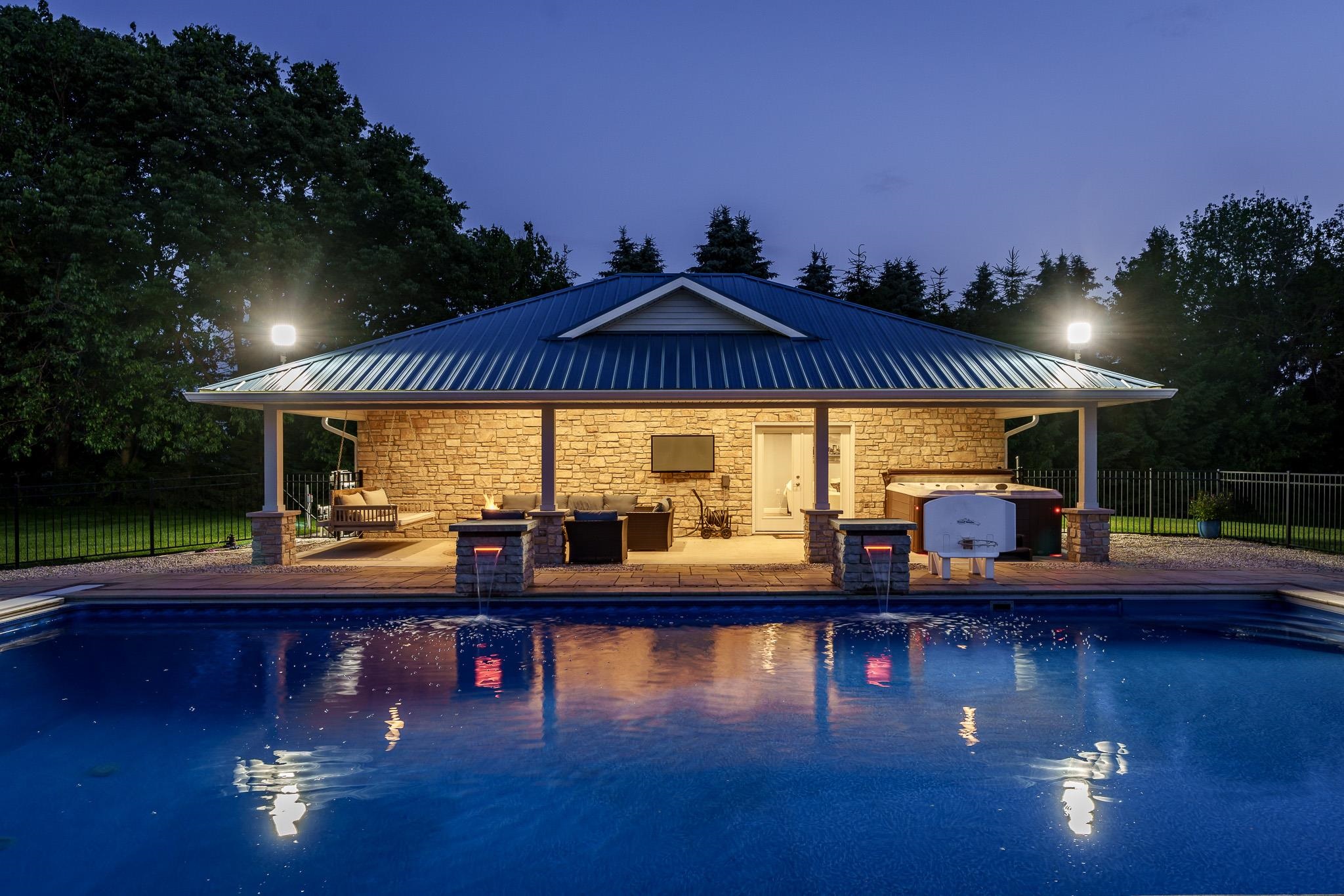 9311 Ridgeview Road Belvidere, IL 61008 - Photo 6 of 89 a view of a swimming pool with sitting space
