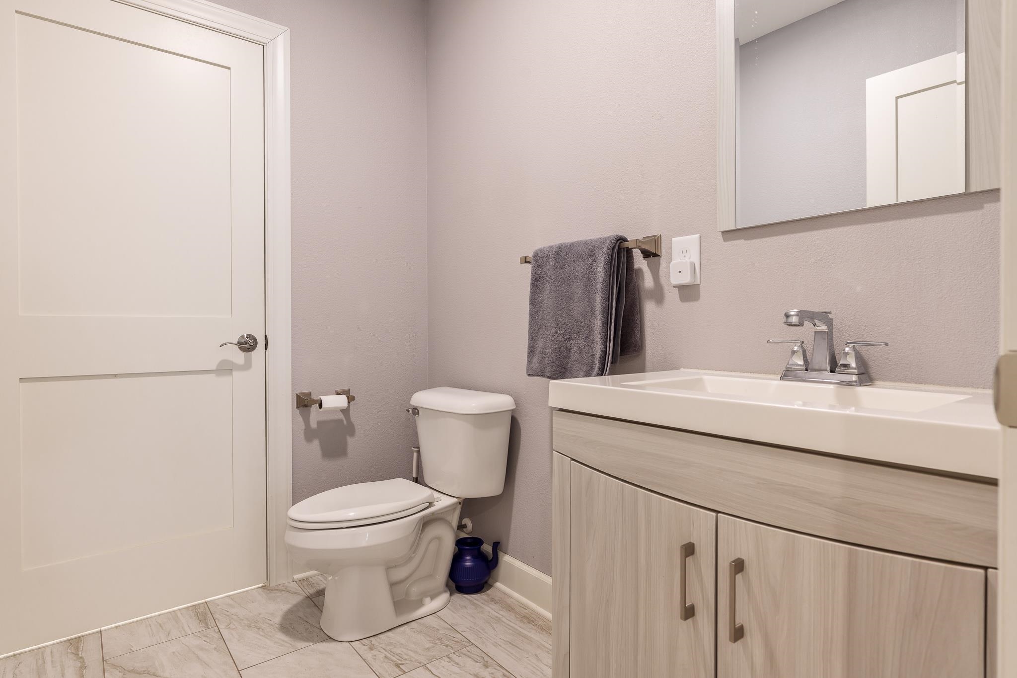 9311 Ridgeview Road Belvidere, IL 61008 - Photo 74 of 89 a bathroom with a sink toilet and mirror