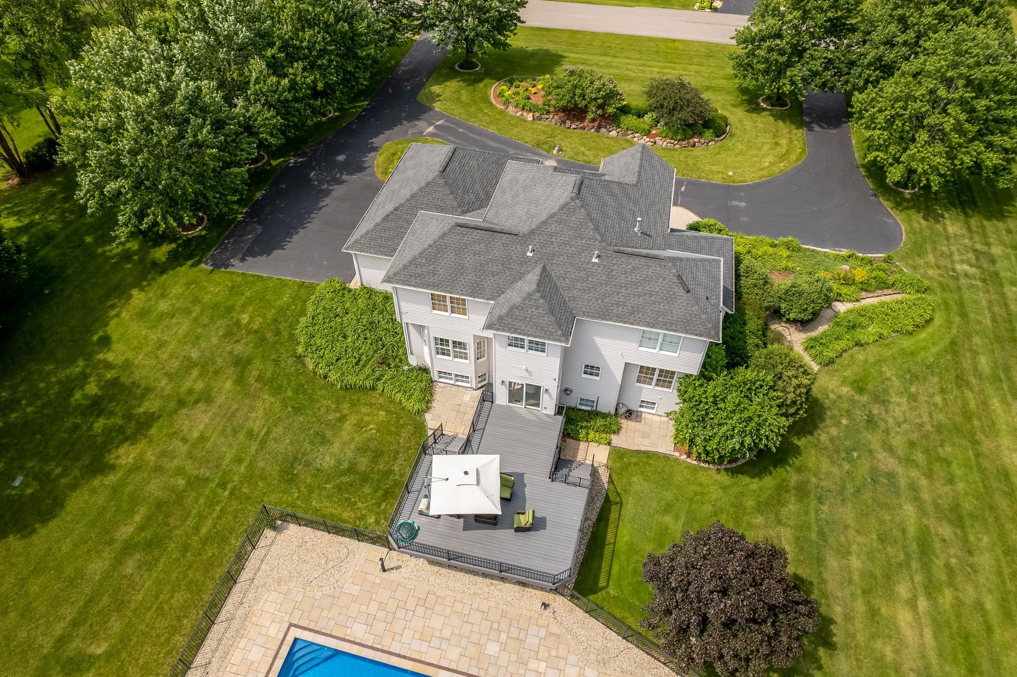 9311 Ridgeview Road Belvidere, IL 61008 - Photo 78 of 89 an aerial view of a house with a garden