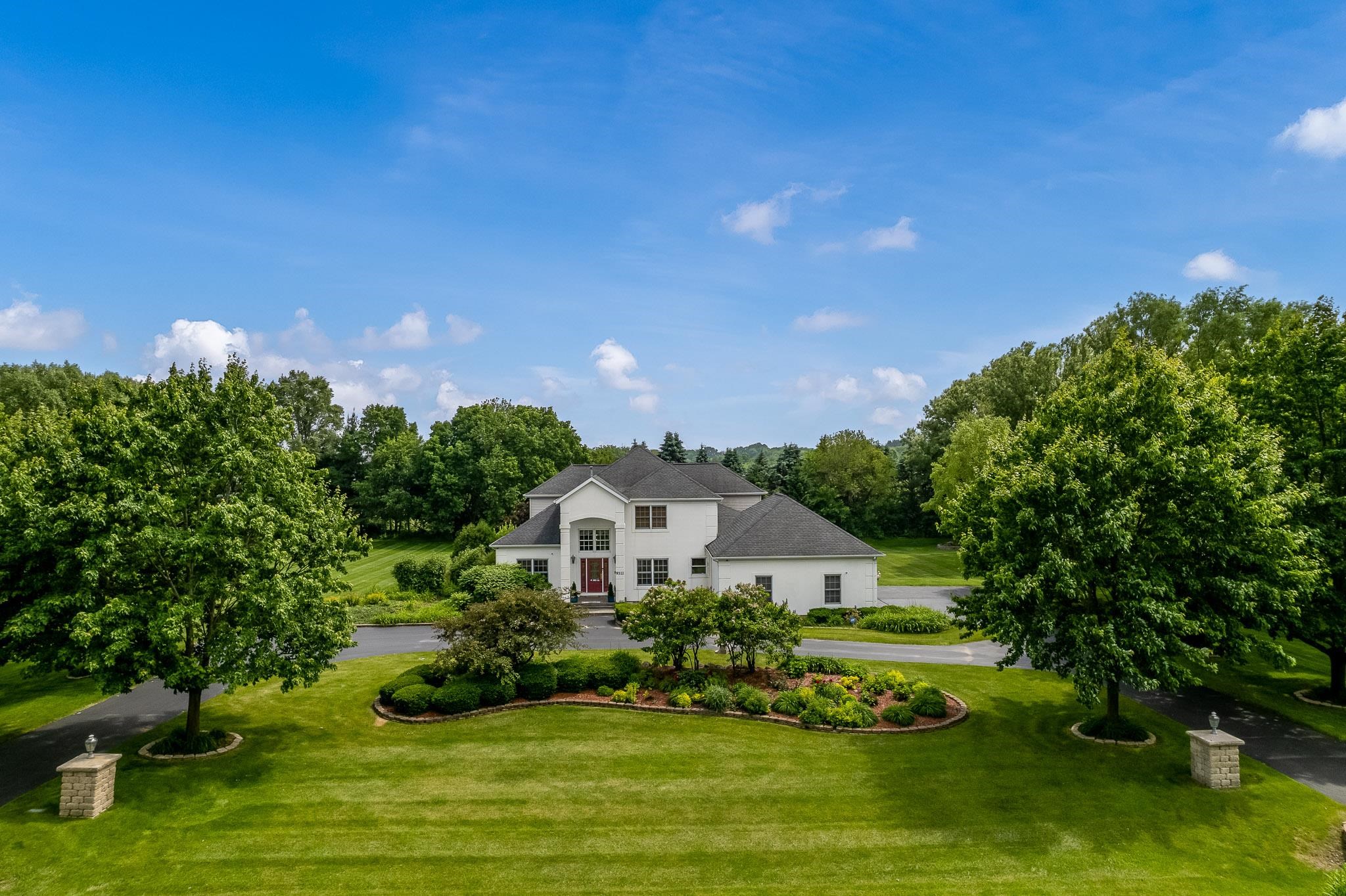 9311 Ridgeview Road Belvidere, IL 61008 - Photo 79 of 89 a front view of a house with a yard