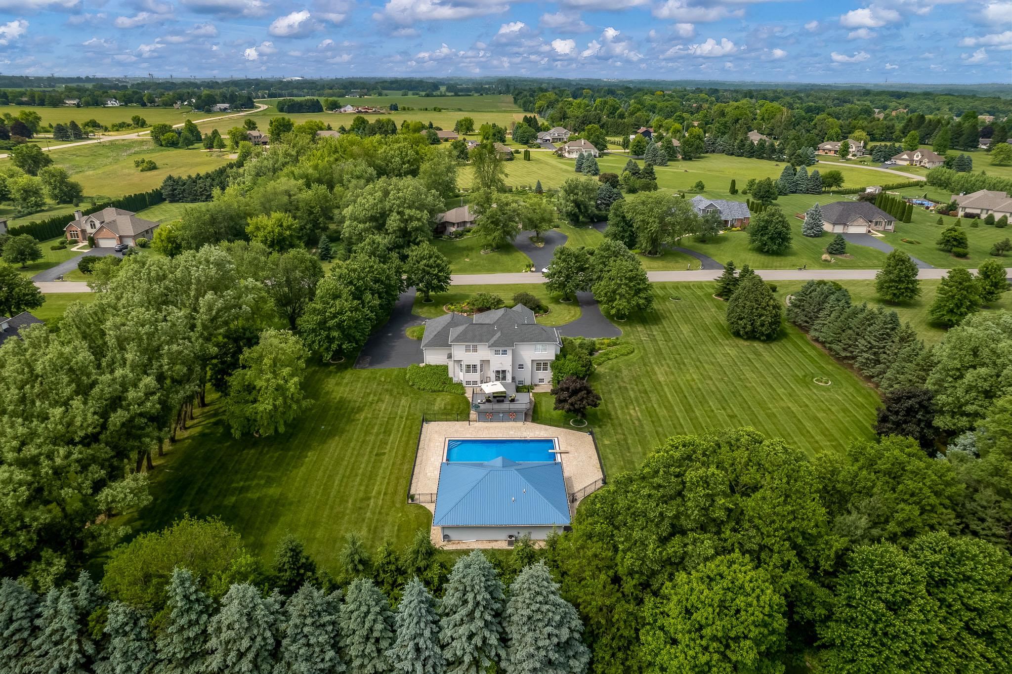 9311 Ridgeview Road Belvidere, IL 61008 - Photo 86 of 89 an aerial view of a house with a yard and lake view