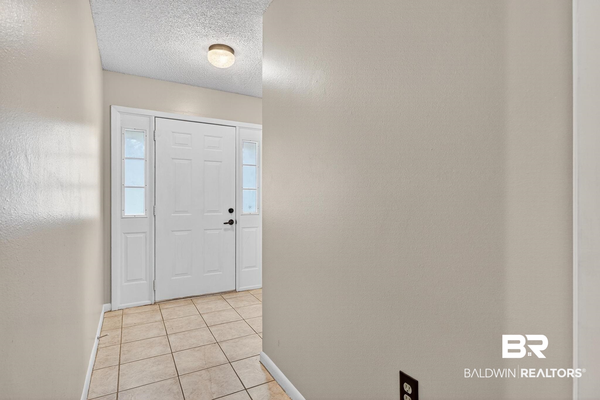 21895 2nd Street Silverhill, AL 36576 - Photo 15 of 43 Foyer featuring light tile floors