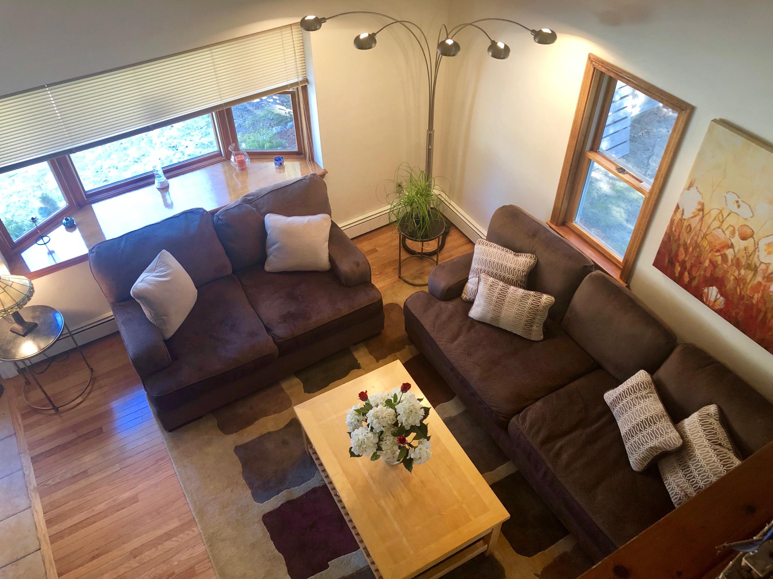233 Oldham Road Osterville, MA 02655 - Photo 11 of 35 a living room with furniture and a large window