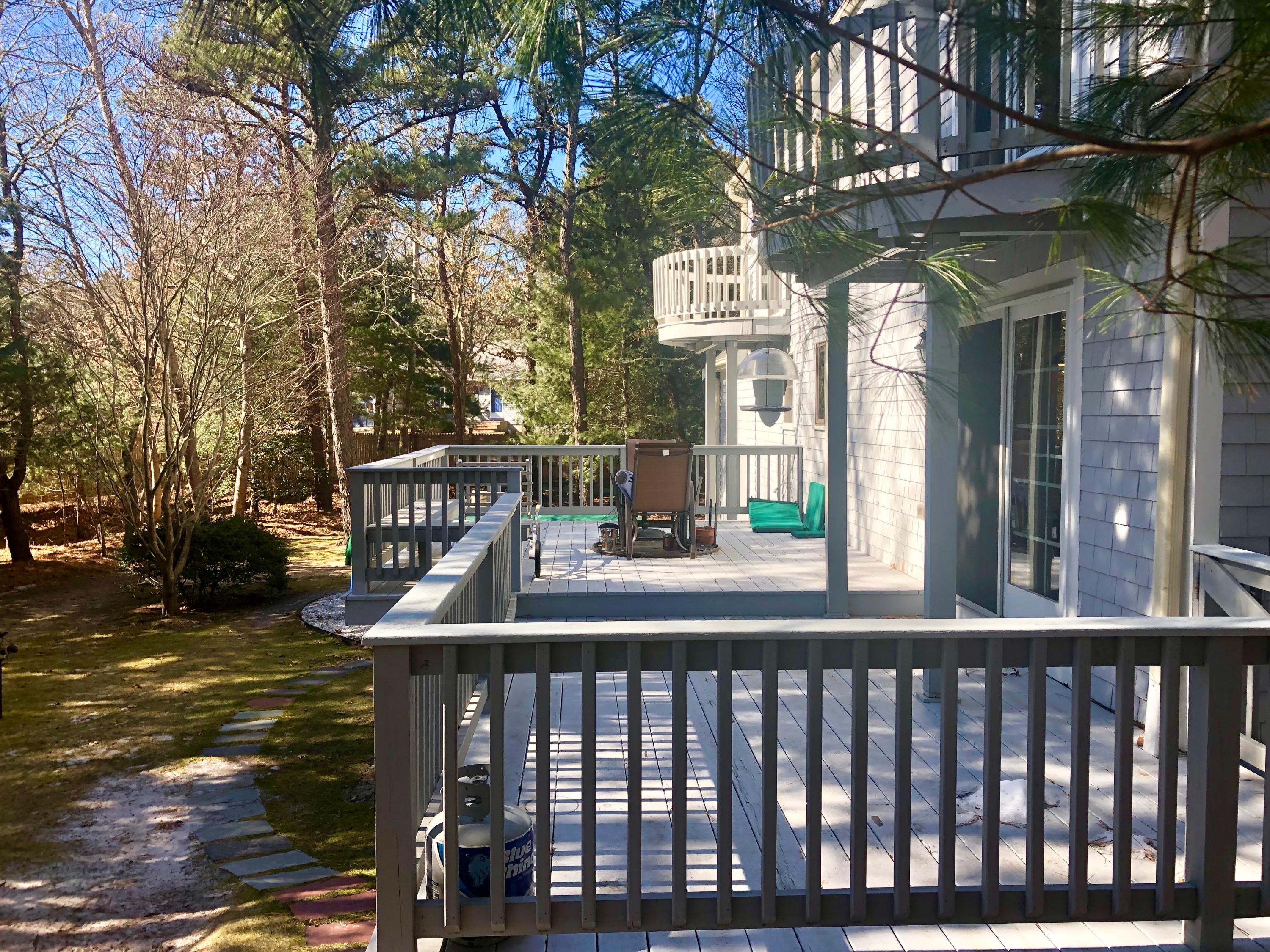 233 Oldham Road Osterville, MA 02655 - Photo 6 of 35 a view of a street with sitting area