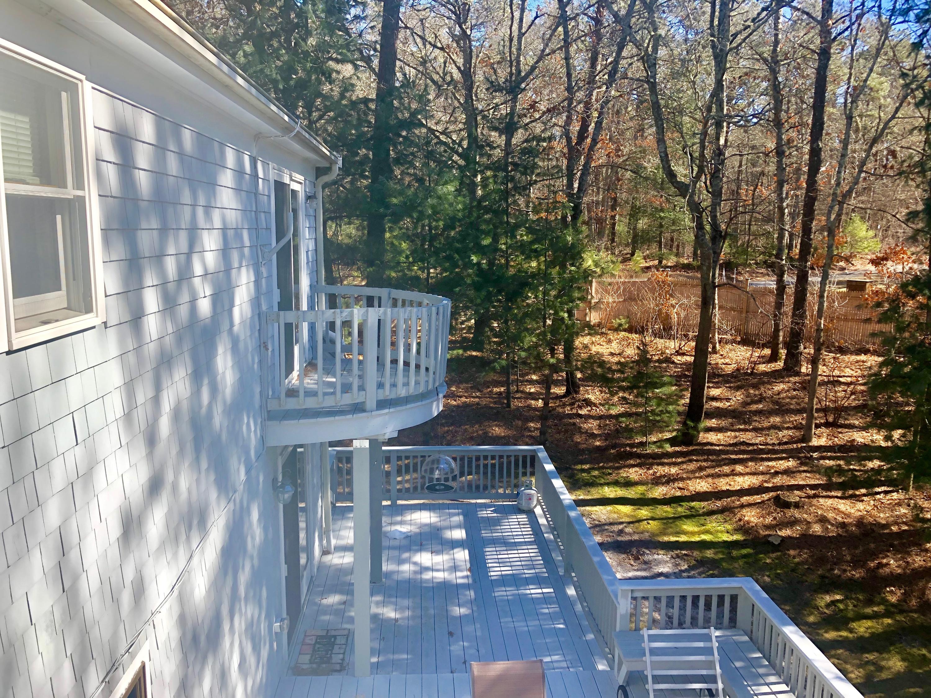 233 Oldham Road Osterville, MA 02655 - Photo 7 of 35 a view of an outdoor space with seating
