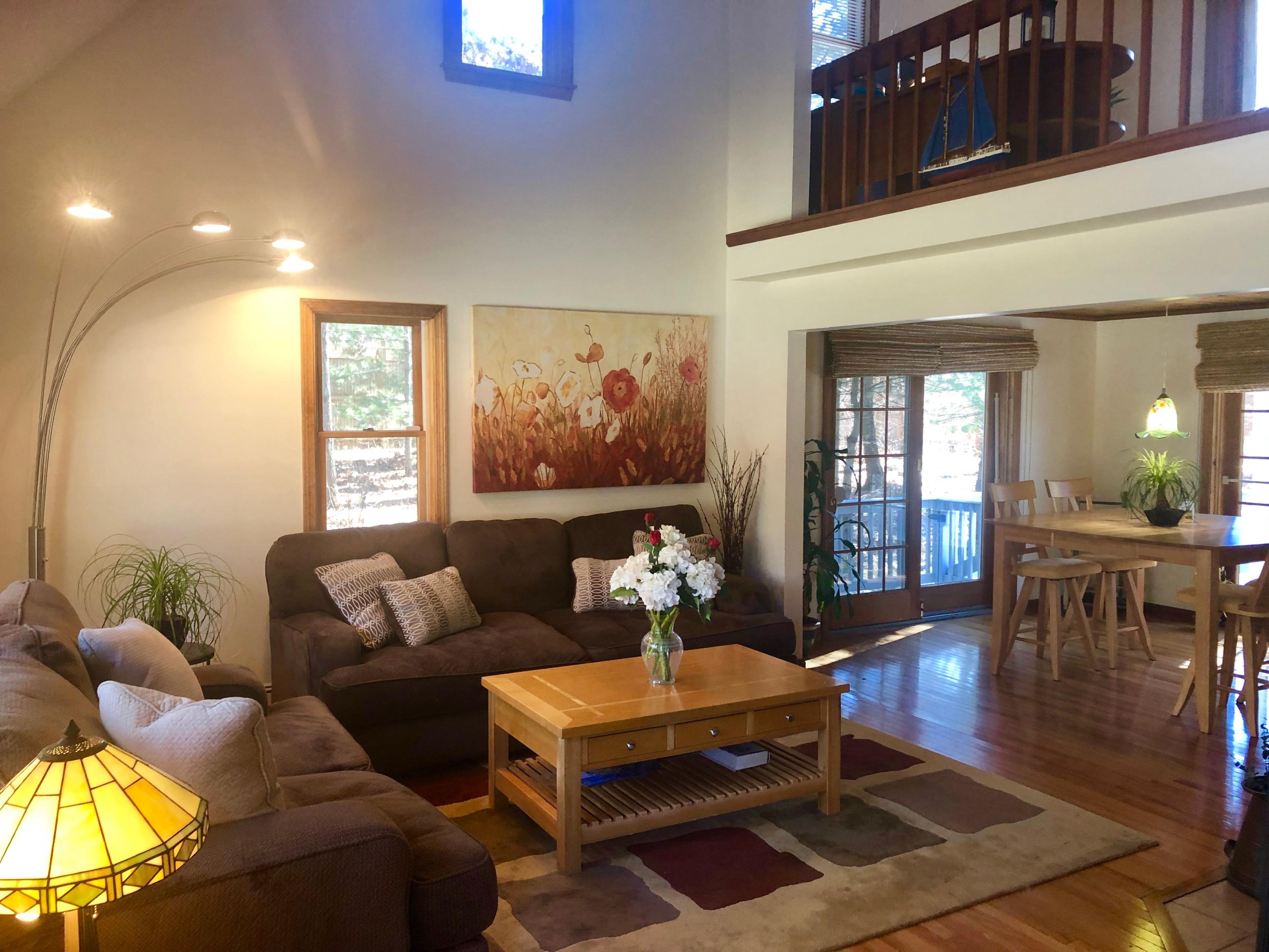 233 Oldham Road Osterville, MA 02655 - Photo 8 of 35 a living room with furniture and a large window