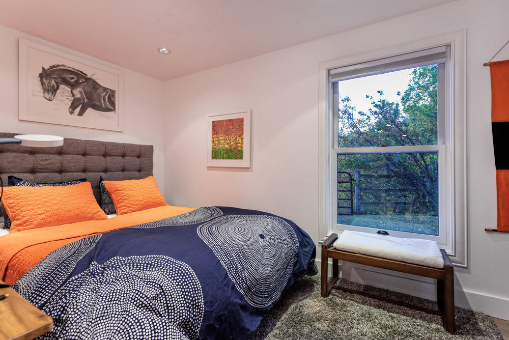 2661 Juniper Hill Road Aspen, CO 81611 - Photo 17 of 31 a bedroom with a bed and a window