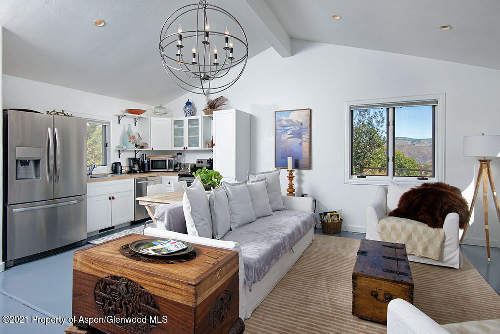 2661 Juniper Hill Road Aspen, CO 81611 - Photo 22 of 31 a living room with furniture and a window