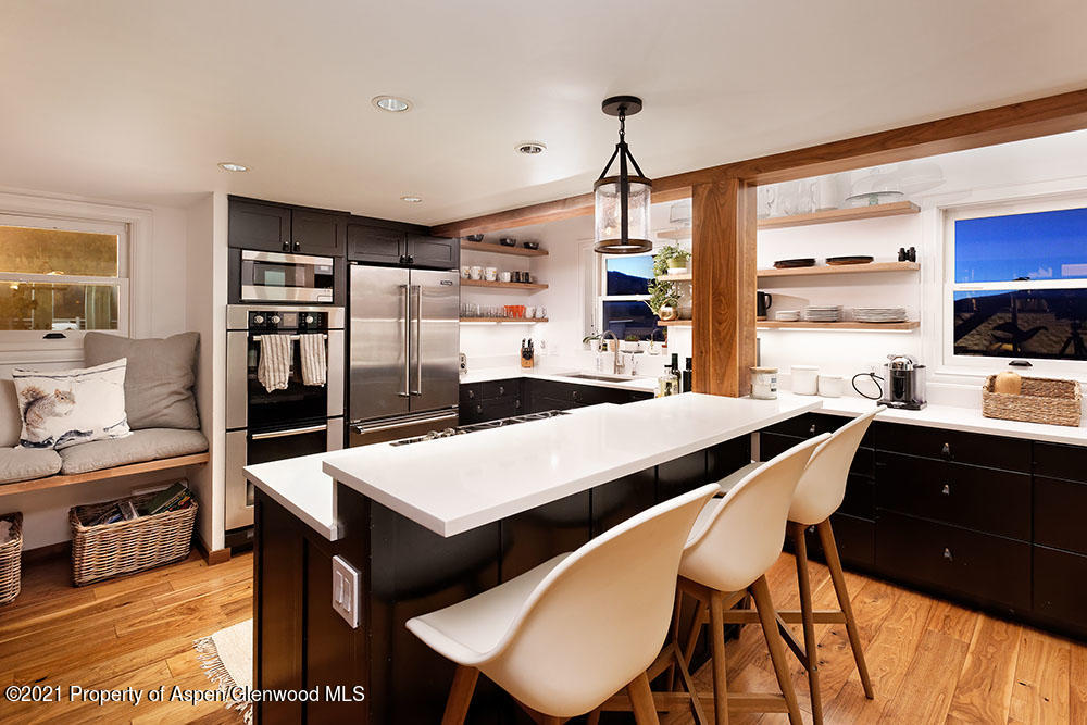2661 Juniper Hill Road Aspen, CO 81611 - Photo 5 of 31 a view of a dining room with furniture