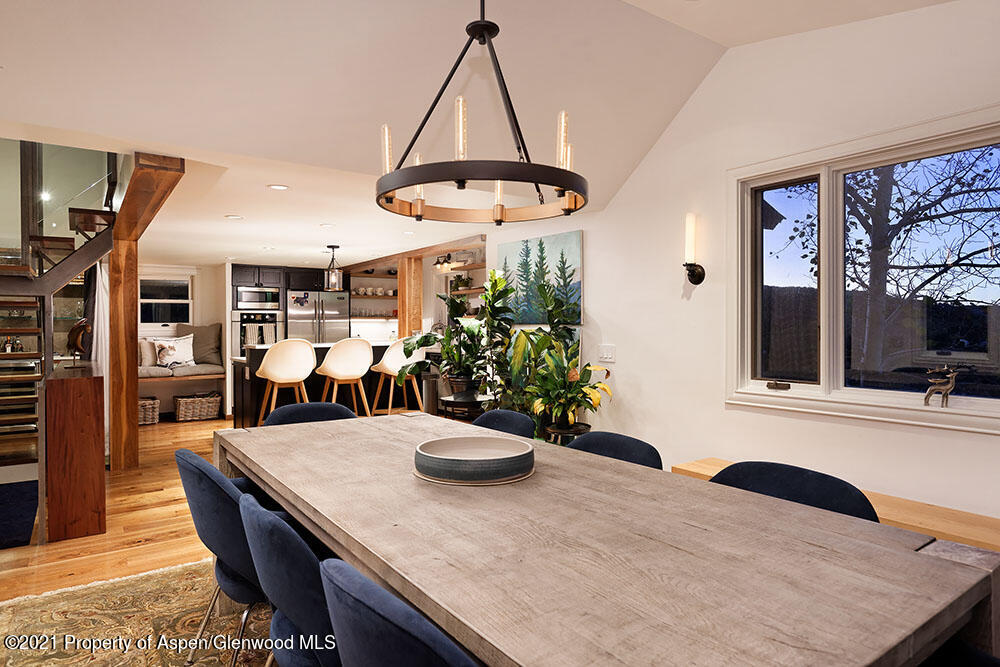 2661 Juniper Hill Road Aspen, CO 81611 - Photo 7 of 31 a kitchen with a table and chairs