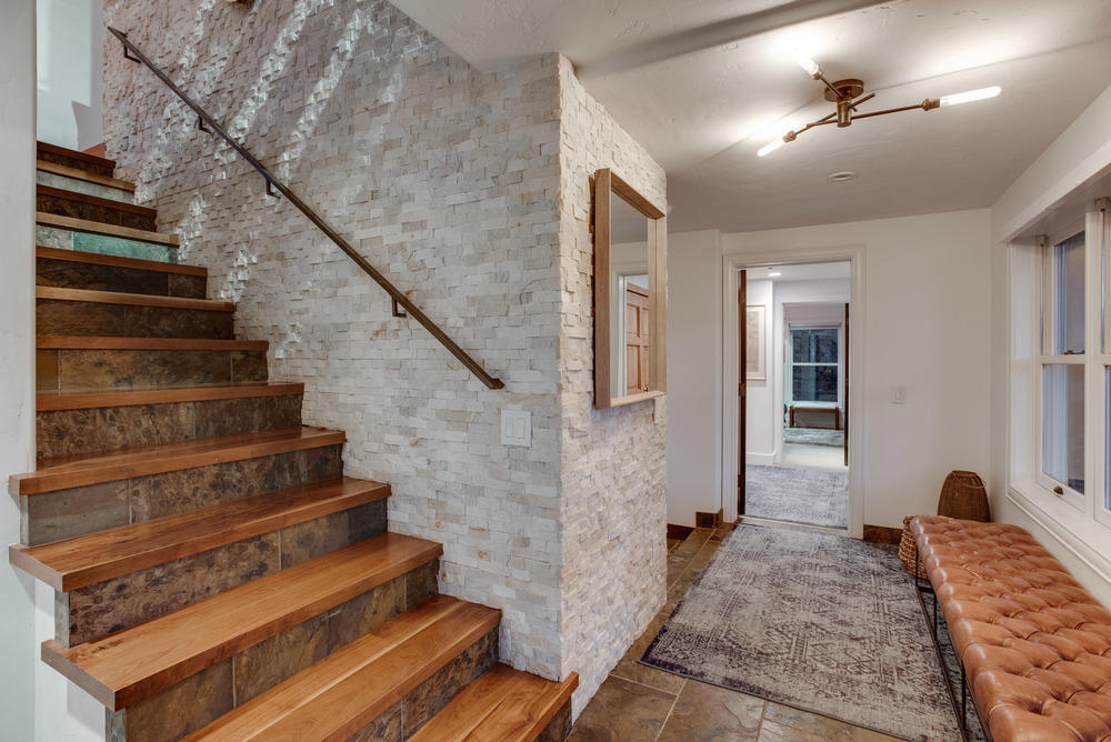 2661 Juniper Hill Road Aspen, CO 81611 - Photo 8 of 31 a view of staircase with white walls and railing