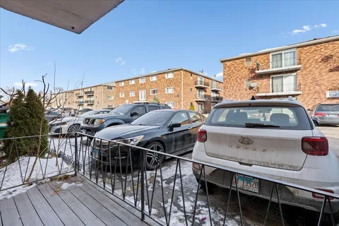 a front view of a house with parking space