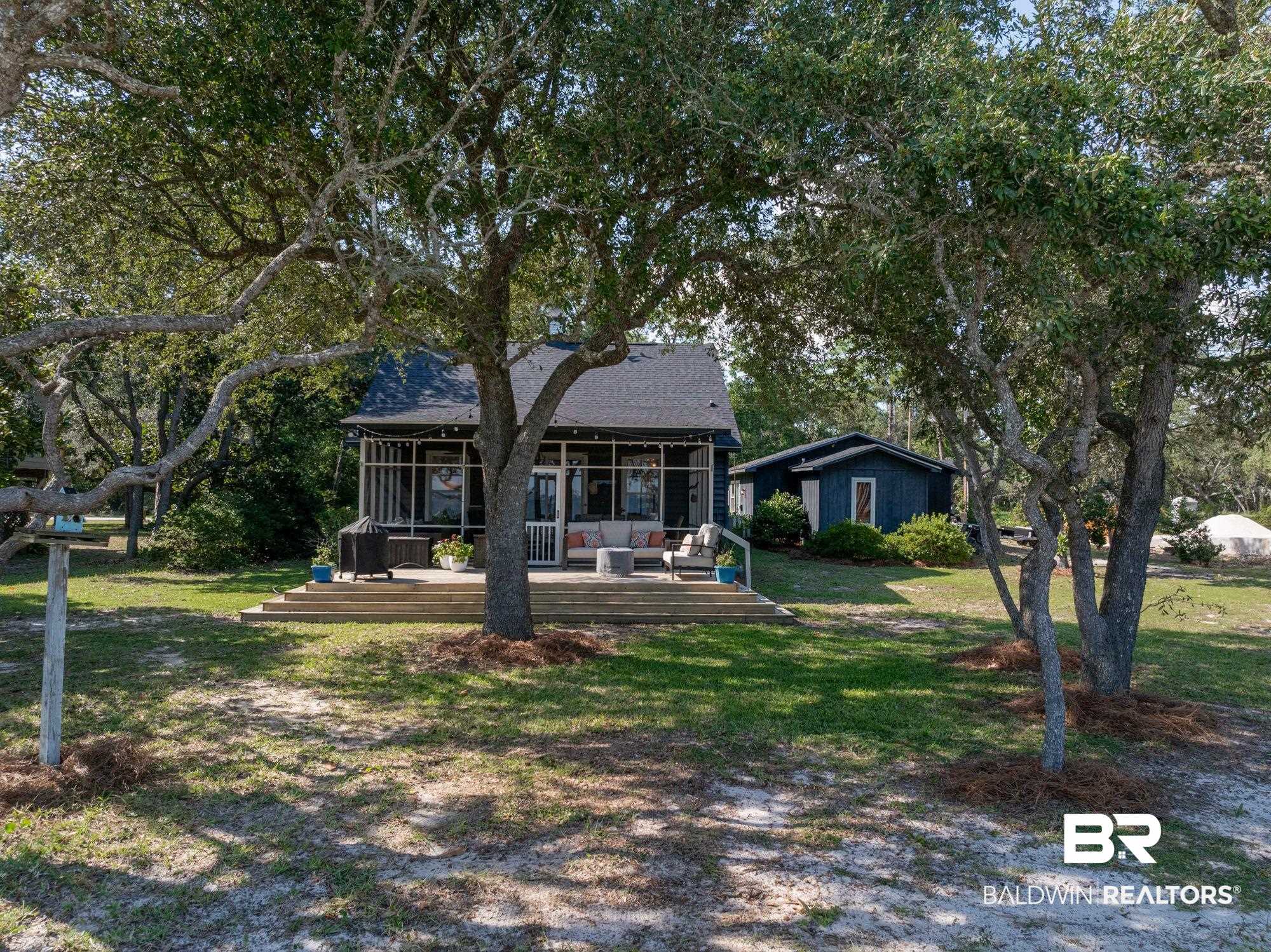 7646 Spring Branch Road Elberta, AL 36530 - Photo 84 of 85 View of front of home featuring a porch and a front yard