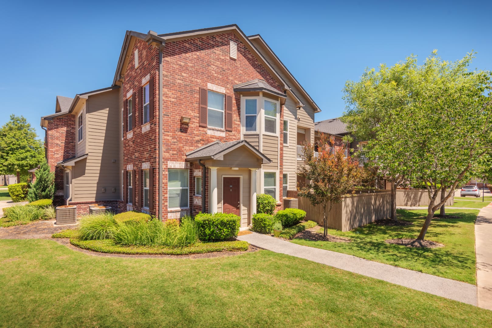 12101 Dessau Road, Unit 102 Austin, TX 78754 - Photo 18 of 20 front view of a house with a yard