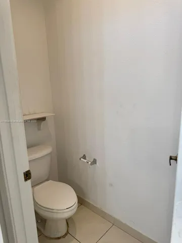 a bathroom with a toilet