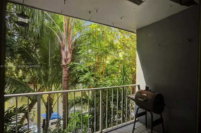a view of a balcony with an outdoor space