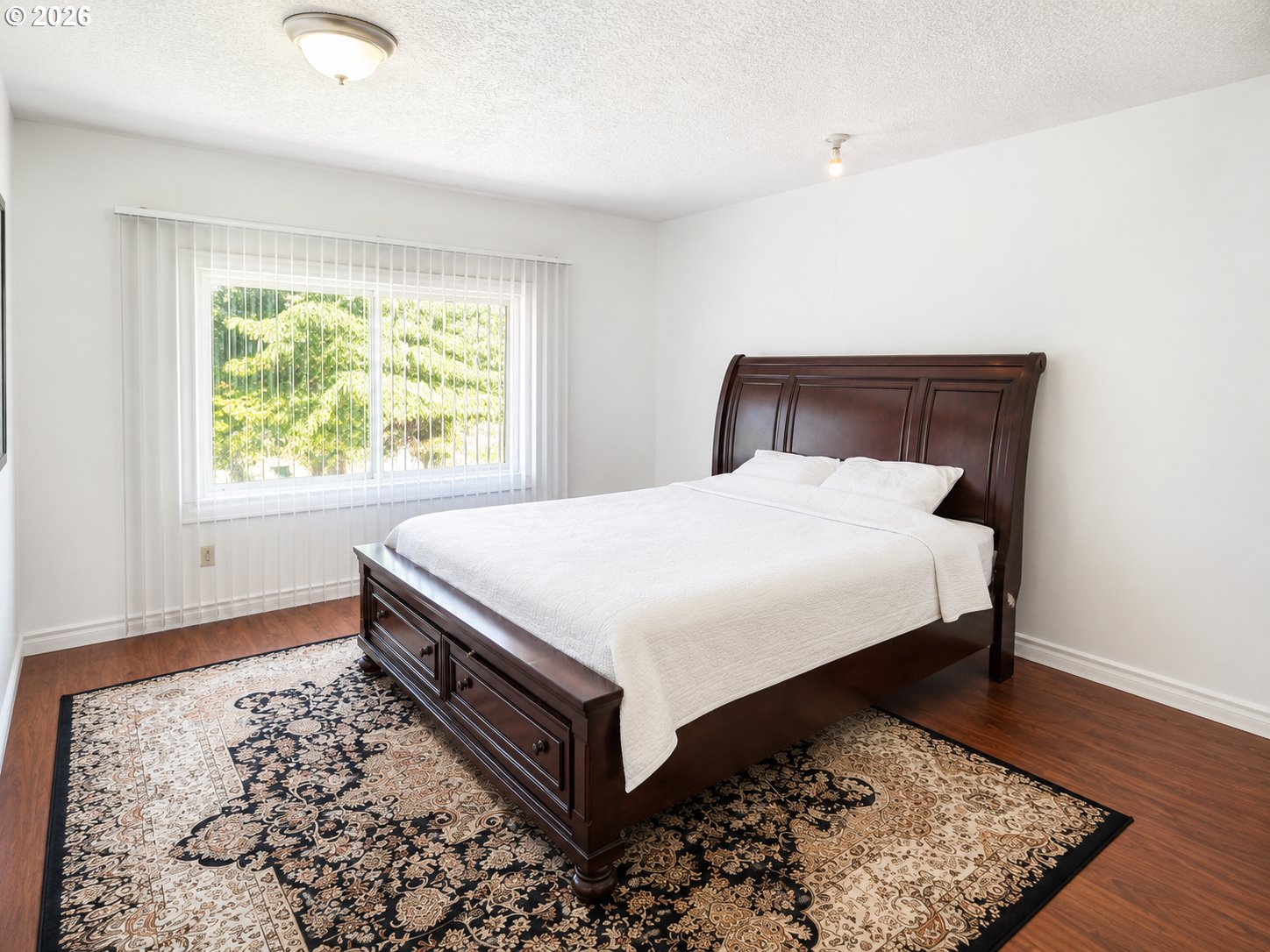 2775 Molalla Road Woodburn, OR 97071 - Photo 12 of 40 a bed sitting in a bedroom next to a window