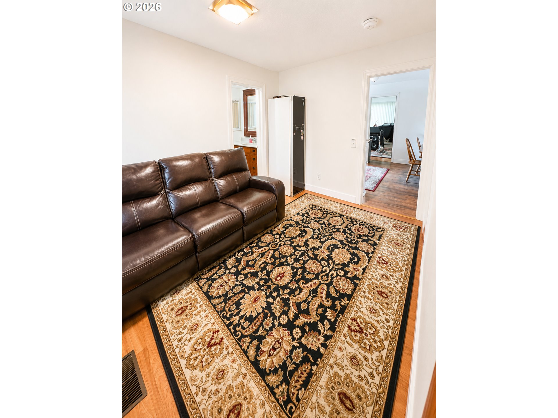 2775 Molalla Road Woodburn, OR 97071 - Photo 31 of 40 a living room with a couch and a rug