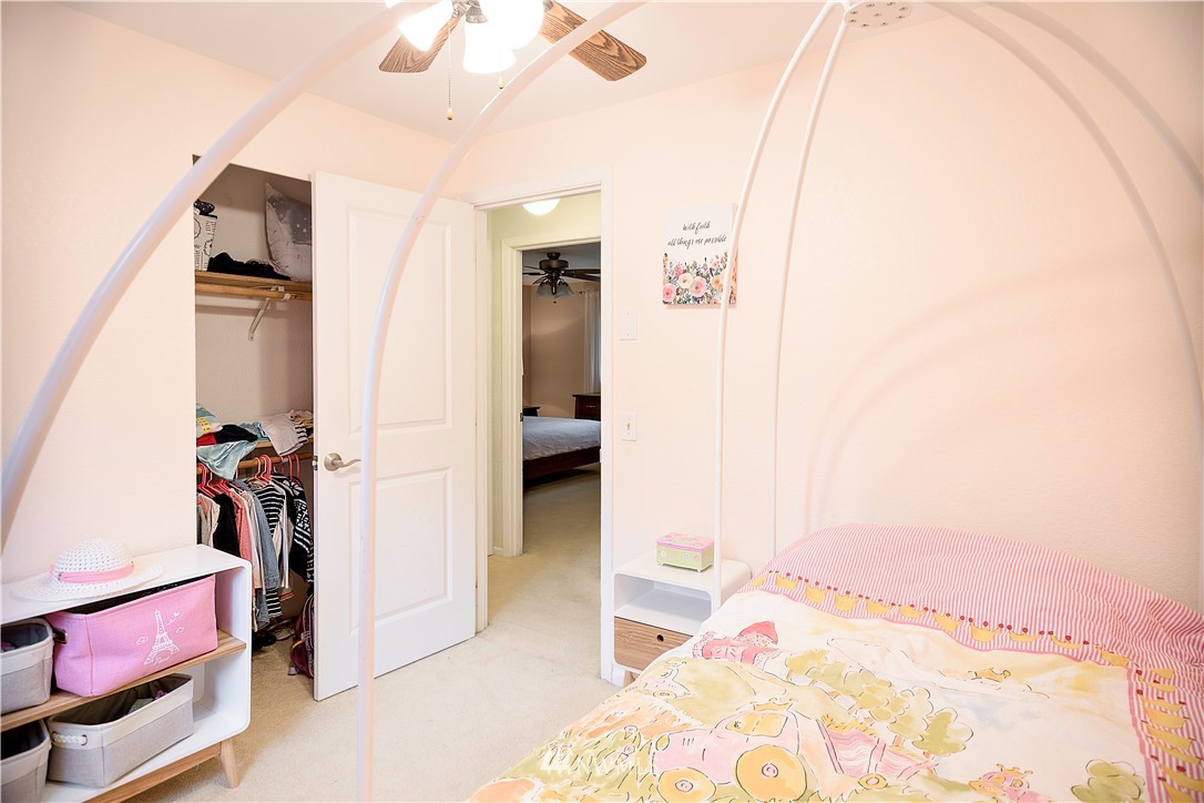 318 161st Place Southeast Bothell, WA 98012 - Photo 18 of 24 a bedroom with a bed and a hallway