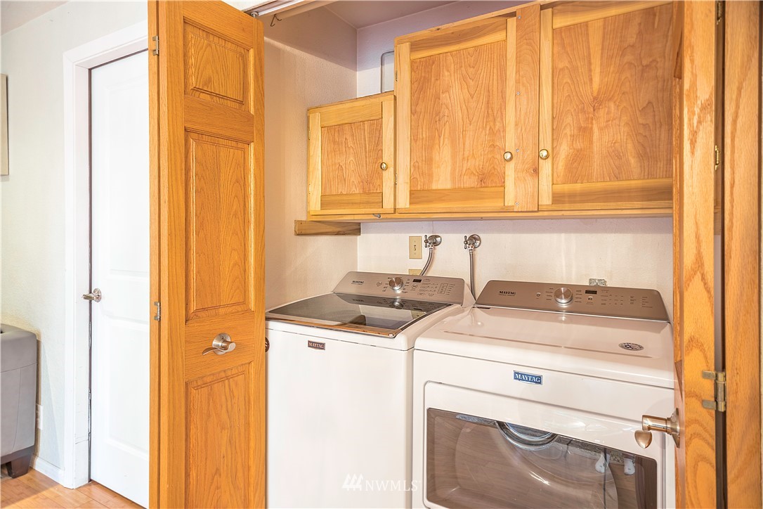 318 161st Place Southeast Bothell, WA 98012 - Photo 21 of 24 a utility room with dryer and washer