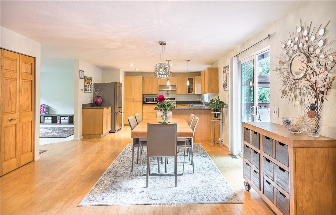 318 161st Place Southeast Bothell, WA 98012 - Photo 5 of 24 a living room with stainless steel appliances granite countertop furniture and a kitchen view