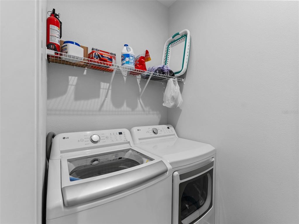 3103 West Leroy Street Tampa, FL 33607 - Photo 24 of 29 a utility room with dryer and washer