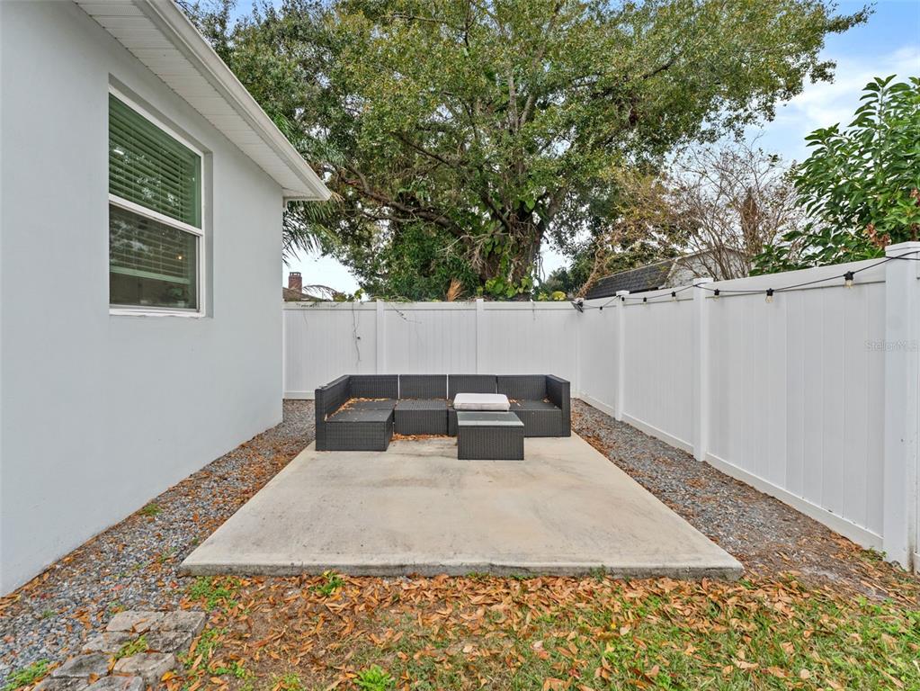 3103 West Leroy Street Tampa, FL 33607 - Photo 27 of 29 a front view of a house with yard
