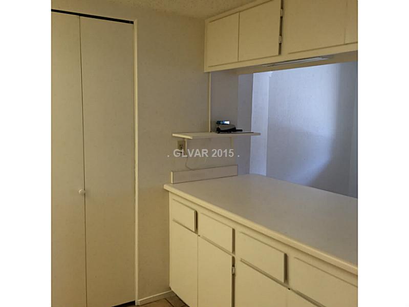5733 Smoke Ranch Road, Unit B Las Vegas, NV 89108 - Photo 11 of 34 Kitchen. breakfast bar