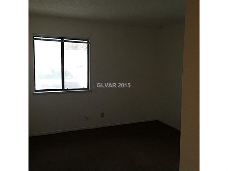 5733 Smoke Ranch Road, Unit B Las Vegas, NV 89108 - Photo 19 of 34 Bedroom.