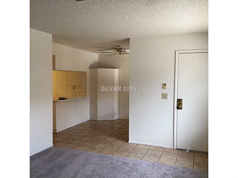 5733 Smoke Ranch Road, Unit B Las Vegas, NV 89108 - Photo 6 of 34 Living Room.