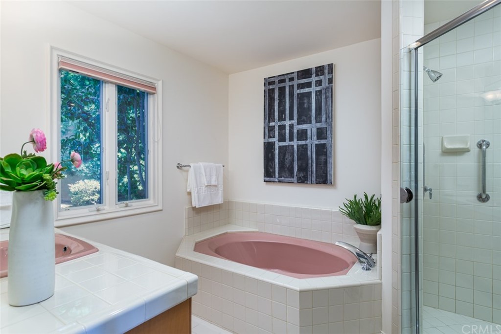 434 Emerald Bay Laguna Beach, CA 92651 - Photo 15 of 39 a bath room with a sink and a window