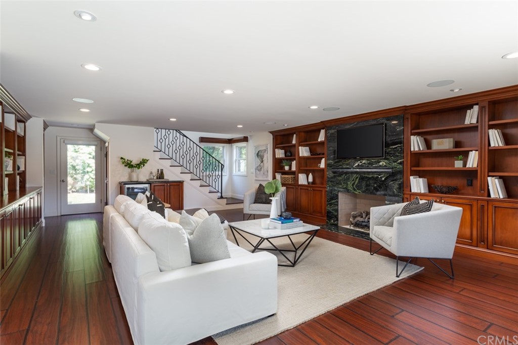 434 Emerald Bay Laguna Beach, CA 92651 - Photo 18 of 39 a living room with furniture and a wooden floor
