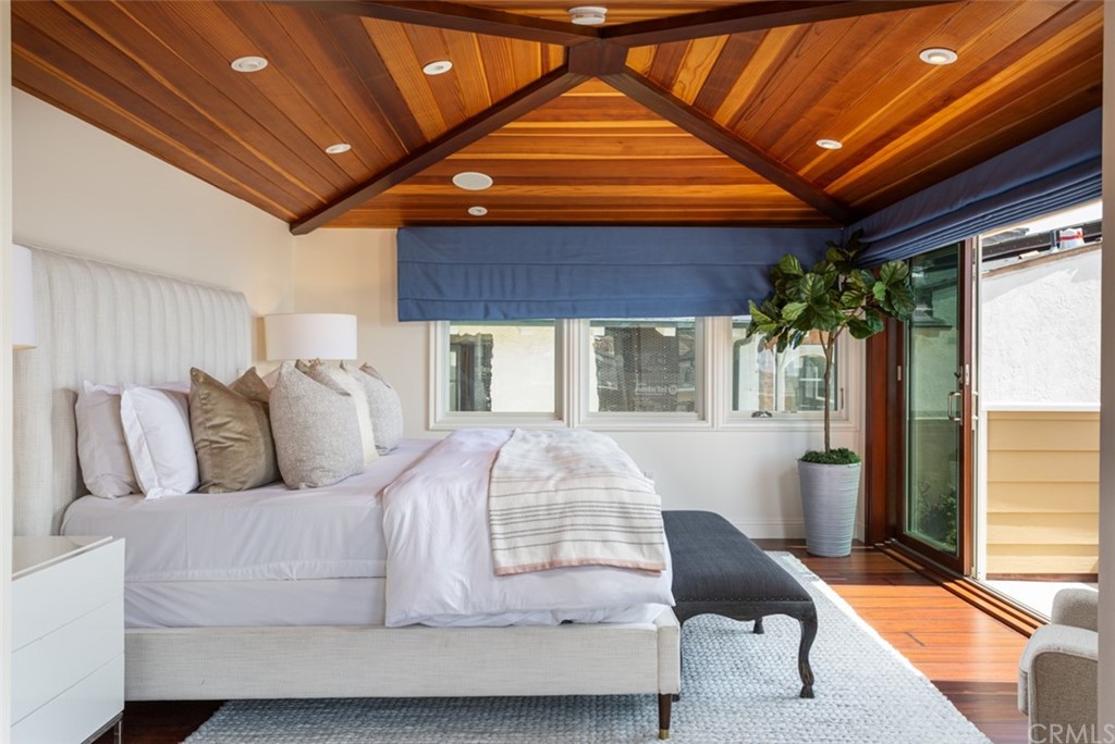 434 Emerald Bay Laguna Beach, CA 92651 - Photo 20 of 39 a bedroom with furniture and a large window