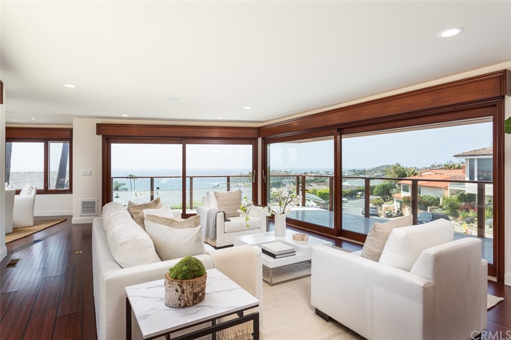 434 Emerald Bay Laguna Beach, CA 92651 - Photo 2 of 39 a living room with furniture and a large window