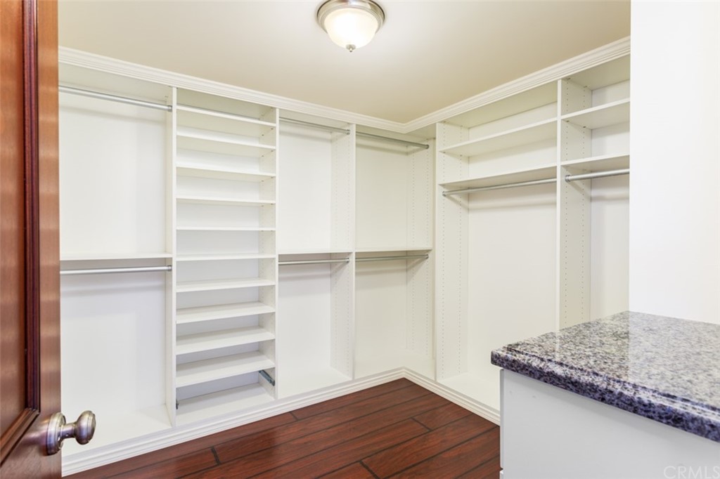434 Emerald Bay Laguna Beach, CA 92651 - Photo 26 of 39 a view of walk in closet with empty racks