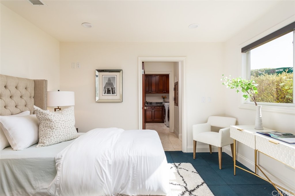 434 Emerald Bay Laguna Beach, CA 92651 - Photo 31 of 39 a large white bed in a white room