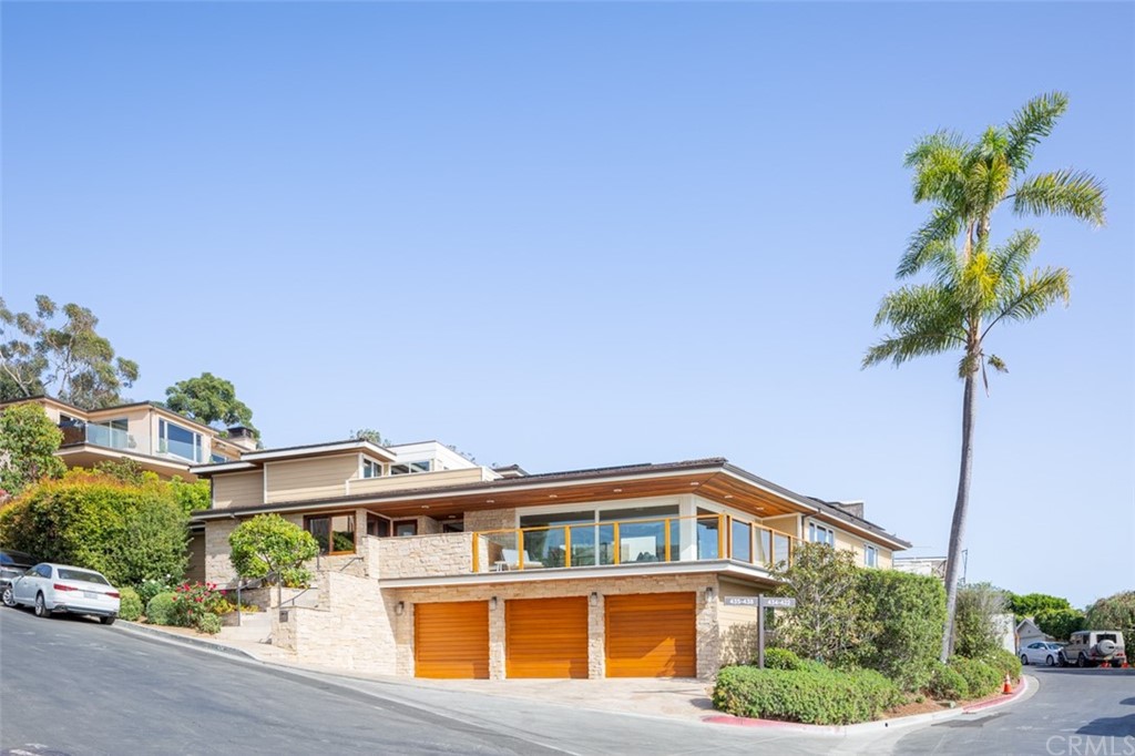 434 Emerald Bay Laguna Beach, CA 92651 - Photo 4 of 39 a front view of a house with a yard